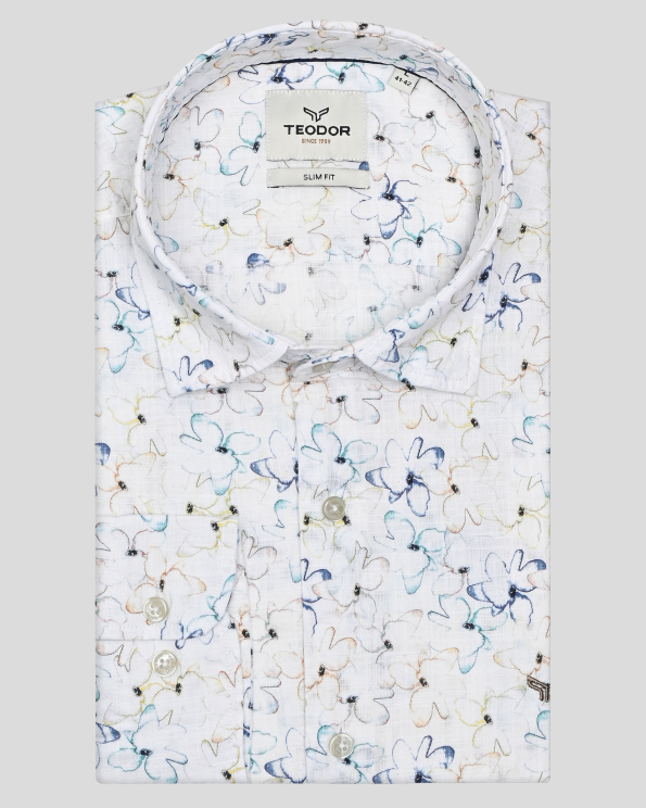 БЯЛА РИЗА С НАВИВАЩИ СЕ РЪКАВИ В МНОГОЦВЕТЕН ФЛОРАЛЕН ДЕСЕН 