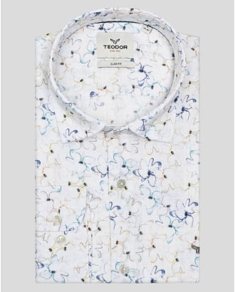 БЯЛА РИЗА С НАВИВАЩИ СЕ РЪКАВИ В МНОГОЦВЕТЕН ФЛОРАЛЕН ДЕСЕН 