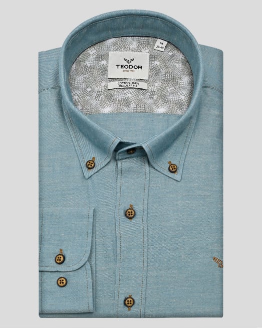 'СИНЬО-ЗЕЛЕНА РИЗА ОТ ПАМУК И ЛЕН С НАВИВАЩИ СЕ РЪКАВИ И БРОДЕРИЯ ЛОГО