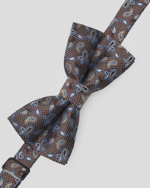 'КАФЯВА ПАПИЙОНКА С КОНТРАСТЕН ДЕСЕН НА КАПЧИЦИ